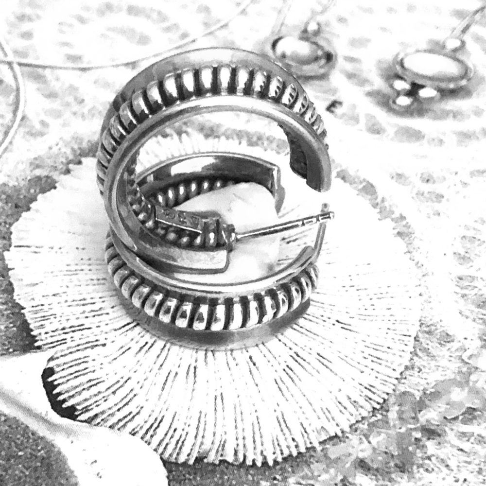 - Silpada Braided Silver Hoop Earrings